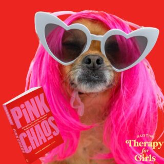 dog in sunglasses with pink chaos book