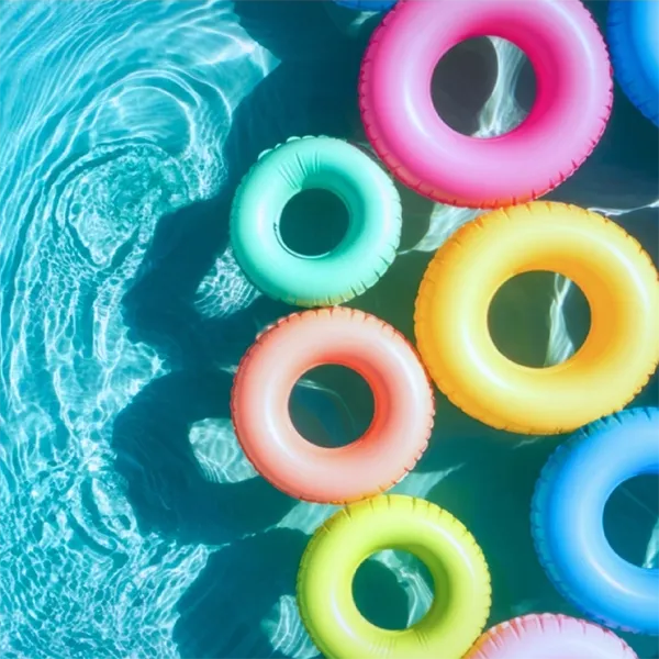 photo of colorful pool floats in swimming pool